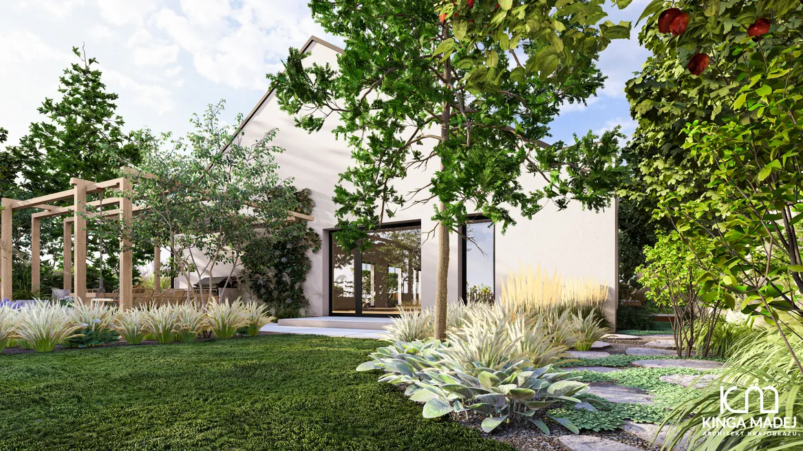 Strefa jadalniana z grillem pod pergolą zakotwioną w ścianie domu. Ostnice, trzcinnik ostrokwiatowy i starzec wełnisty.