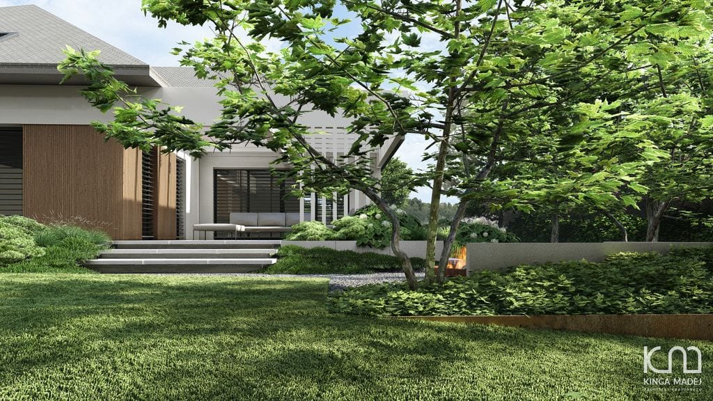 Widok na strefę wypoczynkową z tylnego trawnika.